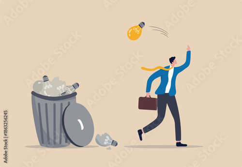 Wasted unworkable ideas, business failure or too many abandoned projects concept, frustrated businessman throw away lightbulb idea into full of junk idea in basket bin
