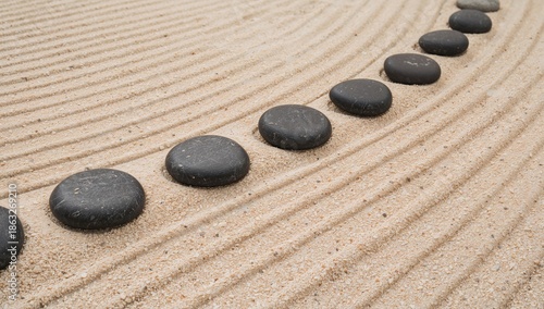 Rock Arrangement in Sand Garden With Raked Patterns and Smooth Stones