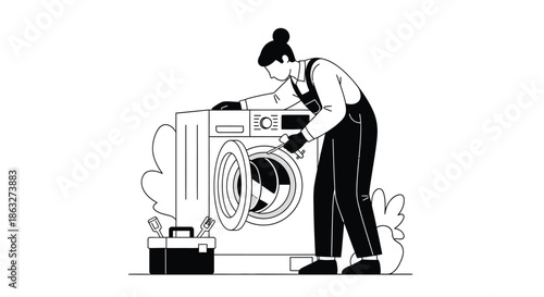A person in overalls repairs a washing machine with tools nearby