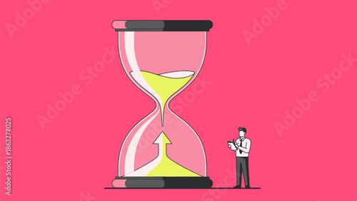 Businessman standing next to giant hourglass on pink background