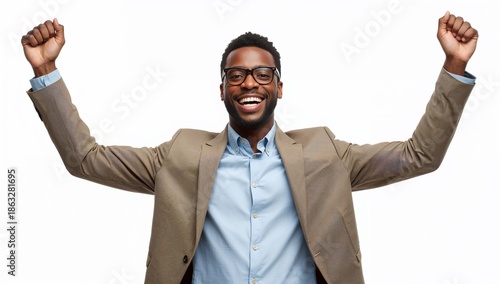 Man Celebrates With Raised Hands and a Big Smile While Wearing a Suit and Gla...
