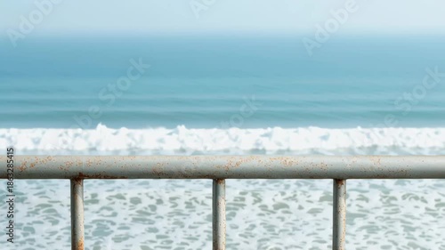 Minimal seaside view with concrete railing and ocean horizon