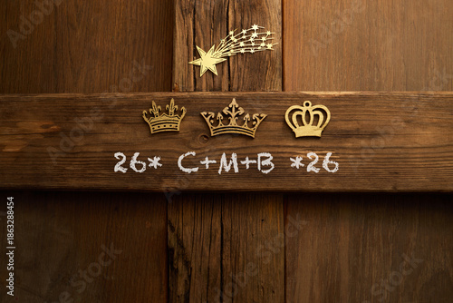 Fotografie Epiphany door blessing with chalk and golden crowns