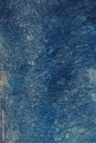 Abstract dark blue frozen water texture