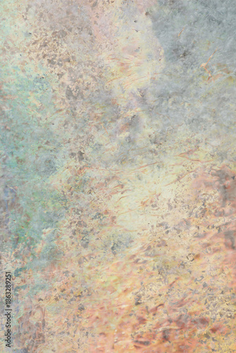 Abstract stone texture with light blues and pinks. 