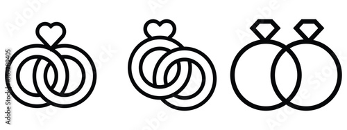 Intertwined wedding rings with heart and diamond symbols