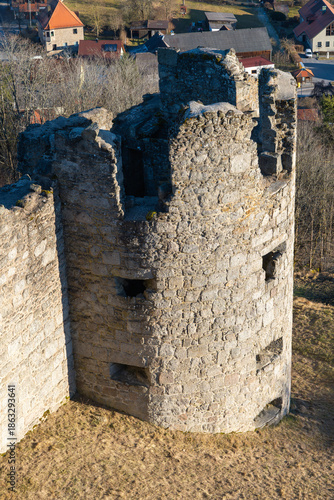 The medieval castle. The ruins of the castle on a winter evening? at sunset.