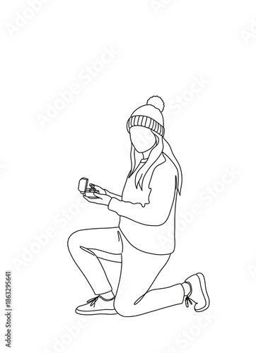 A young woman kneeling on one knee and holding an engagement ring, proposing marriage.