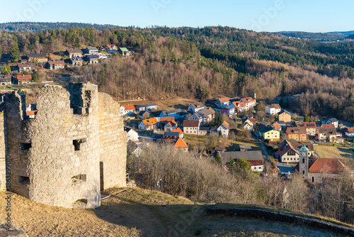 The medieval castle. The ruins of the castle on a winter evening? at sunset.