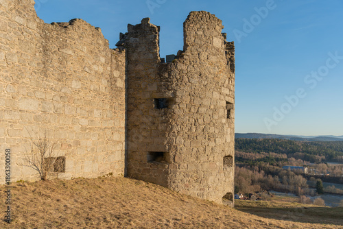The medieval castle. The ruins of the castle on a winter evening? at sunset.
