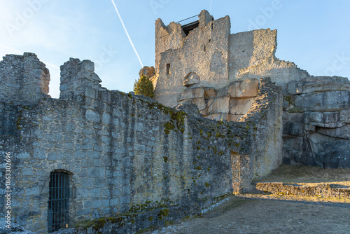 The medieval castle. The ruins of the castle on a winter evening? at sunset.
