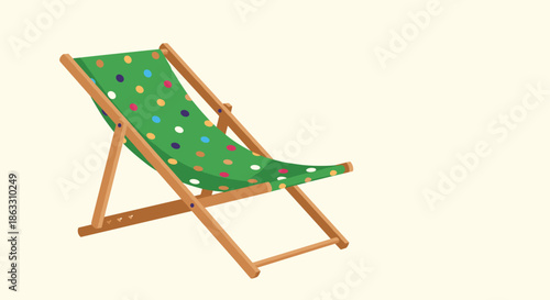Wooden deck chair with a green polka dot fabric seat for relaxing on the beach or in the garden during a summer vacation.