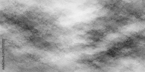 Vintage grunge paper texture featuring an abstract watercolor background of grey and white  flames with black smoke clouds painted on an artistic canvas sky design