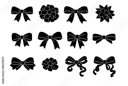 Set of black bows and rosettes on a dark background