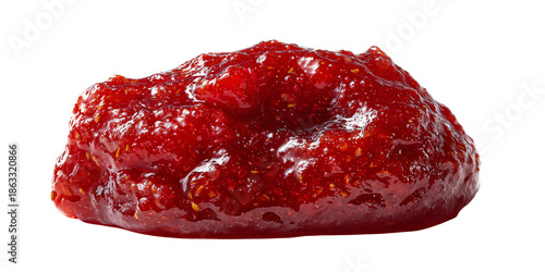 Closeup of glistening strawberry jam with visible fruit pieces, isolated on a black background