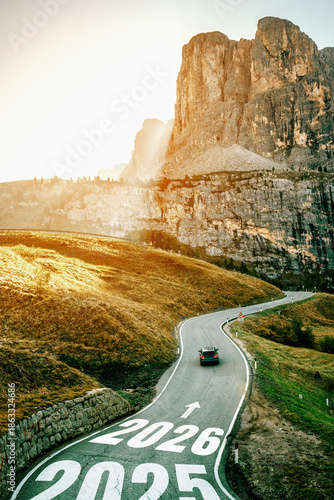 2026 New Year road trip travel and future vision concept . Nature landscape with highway road leading forward to happy new year celebration in the beginning of 2026 for glee and successful start . © InfiniteFlow