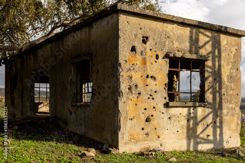 Old War-Damaged Building in Natural Landscape