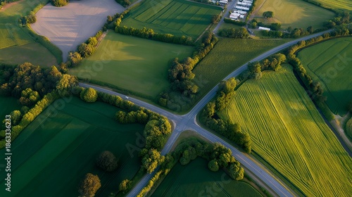 Wallpaper Mural Satellite-style top-down image showing agricultural fields, highways, and industrial areas intersecting, emphasizing land-use mapping, infrastructure development, and spatial planning. cinematic Torontodigital.ca