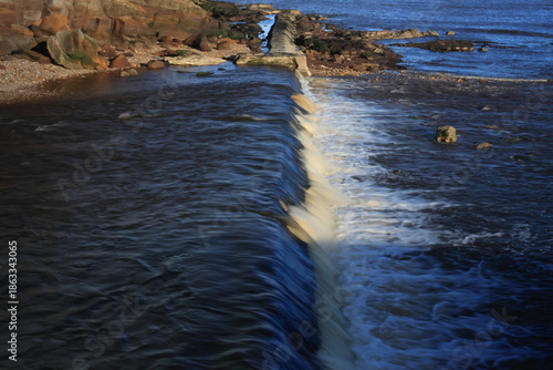 Waterfall by the beach