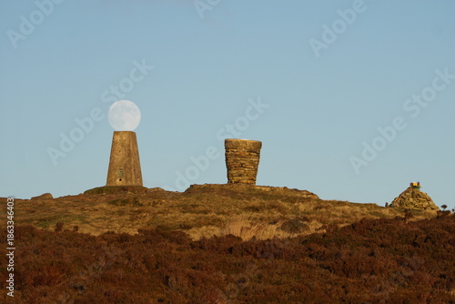 The Moon Tee d up on Pinhaw Beacon on the Pennine Way, Elslack Moor near Lothersdale, North Yorkshire. England, UK
