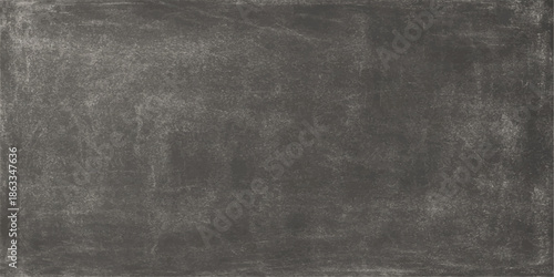 A vintage dark chalkboard surface with a grunge textured pattern and an old gray frame features a blank black canvas with scattered white chalk. textured, grey, paper, wallpaper