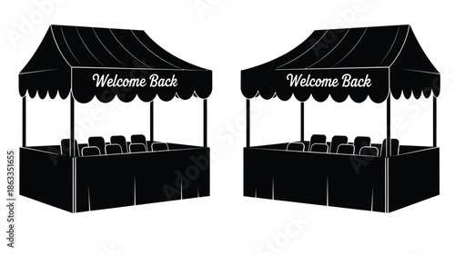 Two black market tents with welcome back banners a striking silhouette