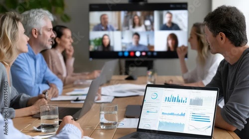 Diverse team collaborates on business strategy during a video conference meeting
