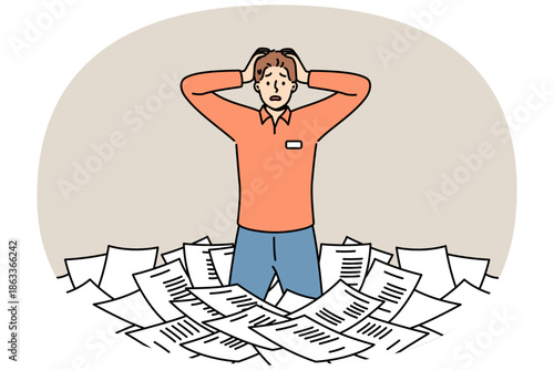 Paperwork and bureaucracy frighten man standing among pile of paper documents and clutching head. Problem of overabundance of paperwork for puzzled clerk or civil service employee.