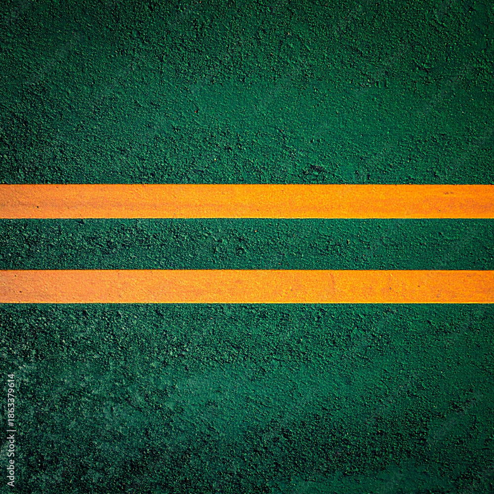Fototapeta premium Abstract green asphalt texture with parallel orange lines. Clean and modern background ideal for presentations, branding, banners and business design projects.