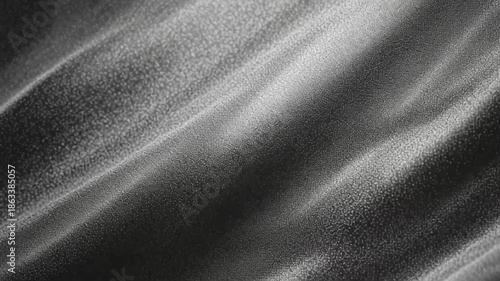 Shimmering black cloth subtly textured waves
