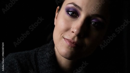 Mysterious Womans Gaze in Low Light.