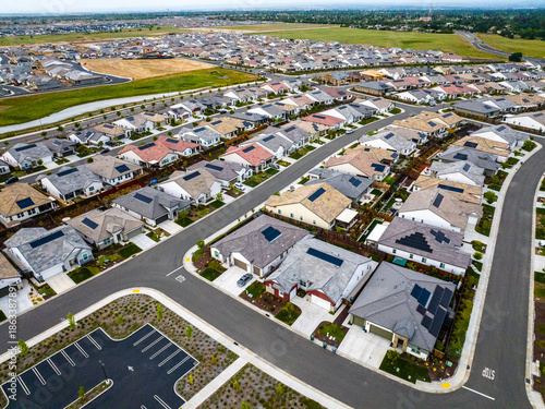aerial view of a Roseville, California middle class brand new residential houses neighborhood in a city suburbs. suburbia