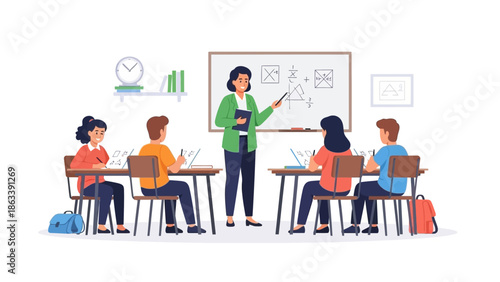 Teacher explaining concepts on a whiteboard to students working on laptops in a classroom setting