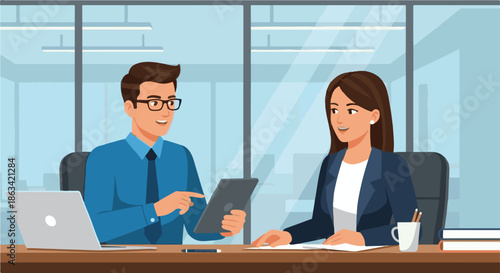 Business meeting between colleagues in a modern office setting, discussing work on a digital tablet