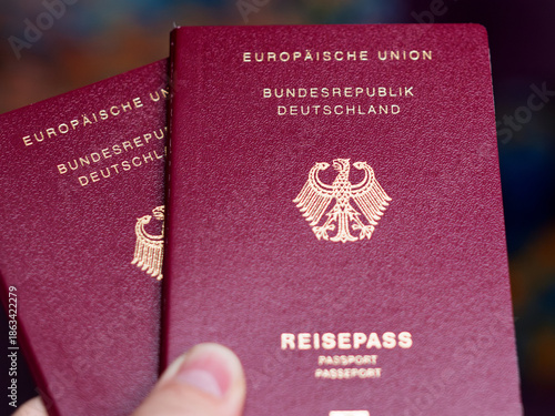 German Passports Held in Hand with Detail