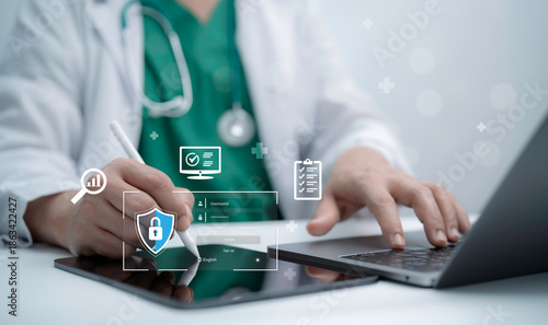 Bild auf Leinwand Doctor using digital tablet and laptop with medical data security interface show