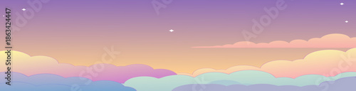 A beautiful orange sunset sky glows over the city landscape as sunlight reflects off distant mountains and clouds during a colorful summer dusk