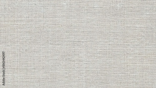 Rough beige linen canvas texture background featuring a natural woven flax fiber pattern and macro textile material surface for a rustic cloth backdrop