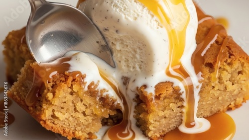 Wallpaper Mural A delicious slice of cake with ice cream and caramel sauce being drizzled on top with a spoon Torontodigital.ca