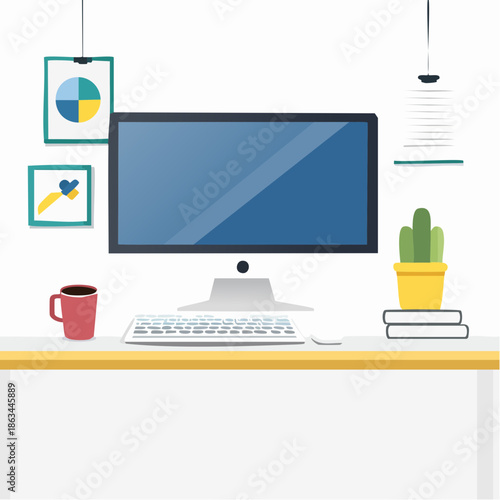Flat lay of a modern home office workspace with a computer, keyboard, mug, plant, and books on a wooden desk against a white background with hanging charts.