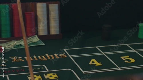 Casino Craps Table Close Up Of Dealers Hands Passing Dice