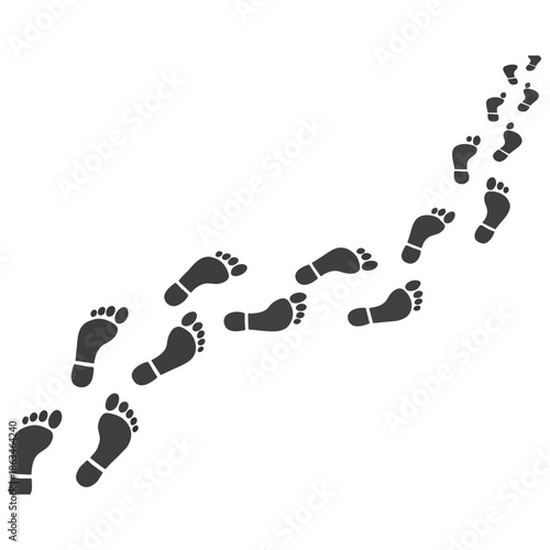 A trail of human footprints walking disappearing into the white distance