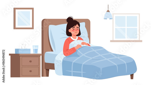 Woman resting in bed at home during a cozy morning in a-bedroom scene.
