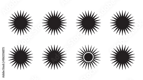 A collection of black and white decorative designs in a grid pattern on a white background viewed from directly above