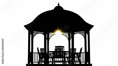 Silhouette of a garden gazebo with table and chairs.