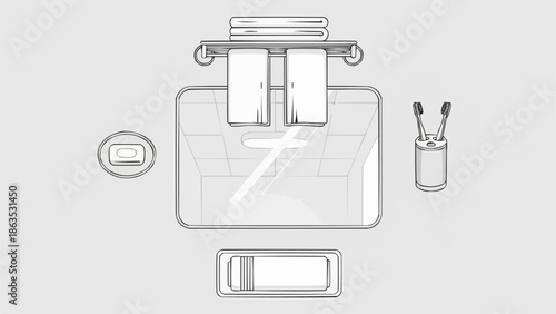 Overhead view of a clean bathroom sink with toiletries and towels.