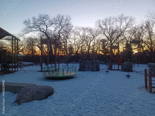 Canvas Print Orange playground structure covered with snow