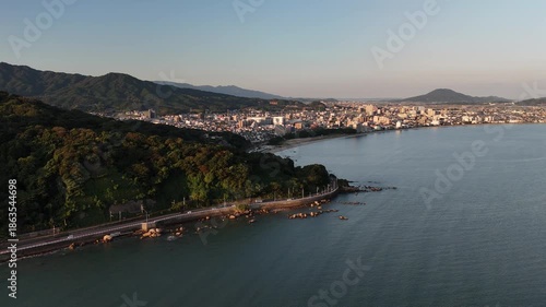 Wallpaper Mural Japan Coastline on Sunrise – Nishi Ward, Fukuoka Prefecture, Kyushu Island: 4K Aerial Footage of Yacht Harbour, Forest Park, Beach, Sea, Coastal Road, Town, Houses, Estates in Ikinomatsubara and Odo Torontodigital.ca