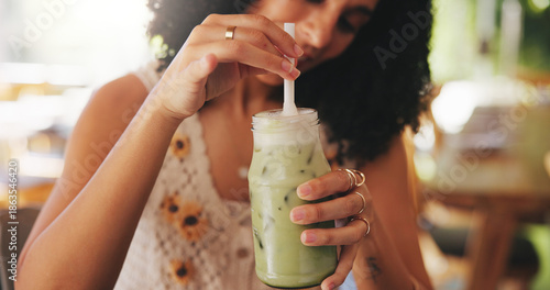 фотографія Hands, matcha or drink with woman in coffee shop with iced beverage for thirst, refreshing or hydration with stir