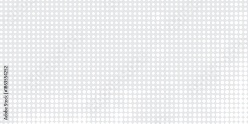 Minimalist monochrome halftone background featuring small evenly spaced dots and gentle texture.
